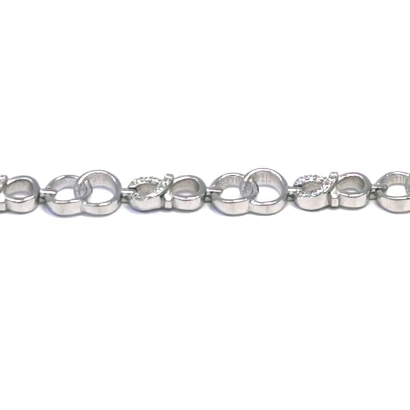 white stone infinity sign bracelet with hoop in hallmarked, rhodium-plated 925 sterling silver – detail view – DRESCHER Jewellery®