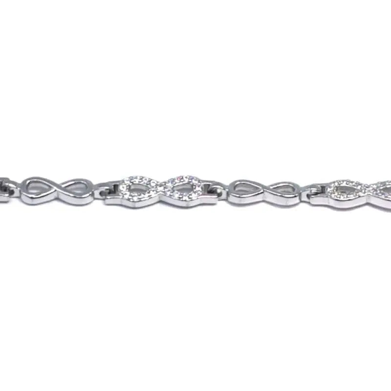 white stone infinity sign bracelet in hallmarked, rhodium-plated 925 sterling silver – full front view – DRESCHER Jewellery®