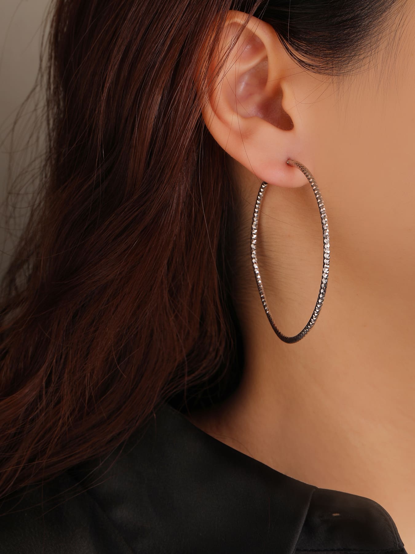 5.5 cm diamond-engraved hoop earrings in hallmarked, rhodium-plated 925 sterling silver – worn view – DRESCHER Jewellery®