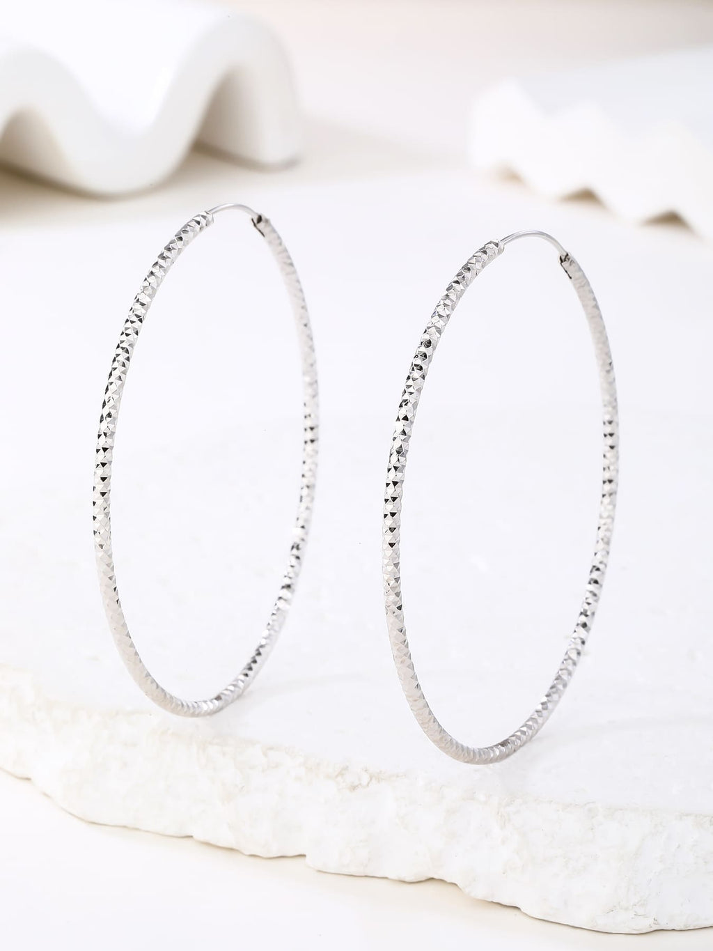 6 cm diamond-engraved hoop earrings in hallmarked, rhodium-plated 925 sterling silver – display view – DRESCHER Jewellery®