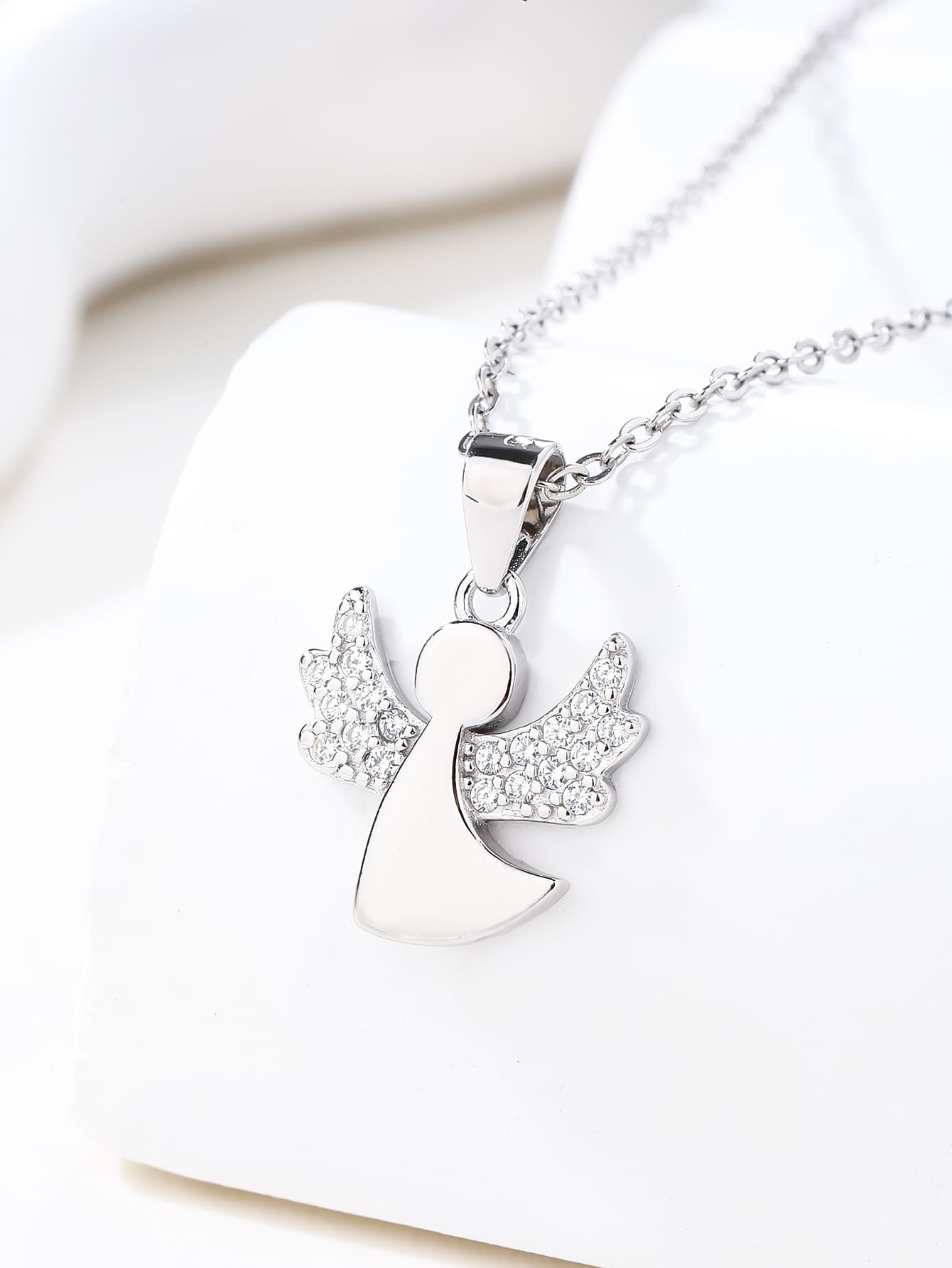 Cubic zirconia hallmarked, rhodium-plated 925 sterling silver angel pendant – displayed on chain – DRESCHER Jewellery®