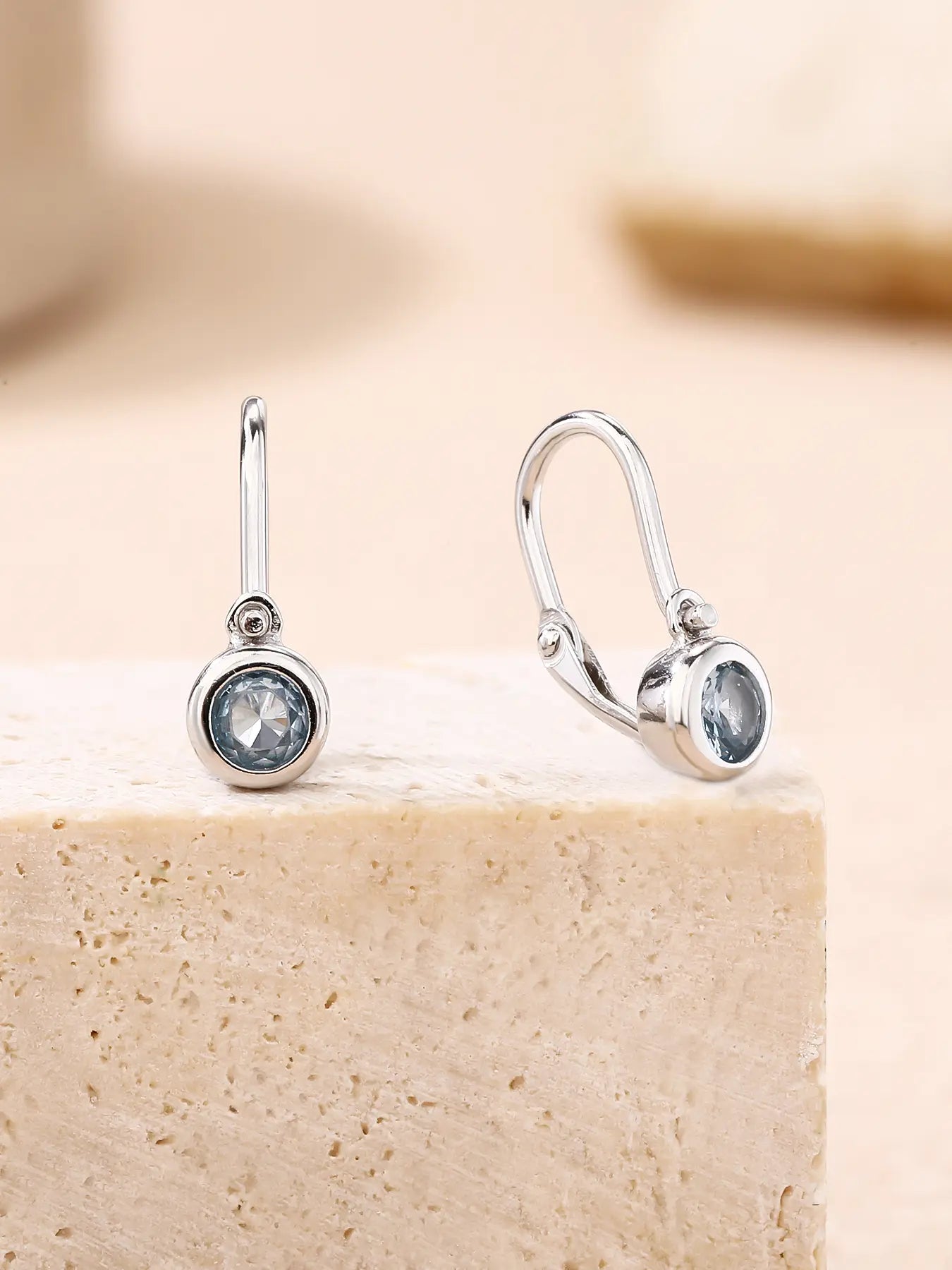 Aqua blue stone baby earrings - front clasp with 1 stone