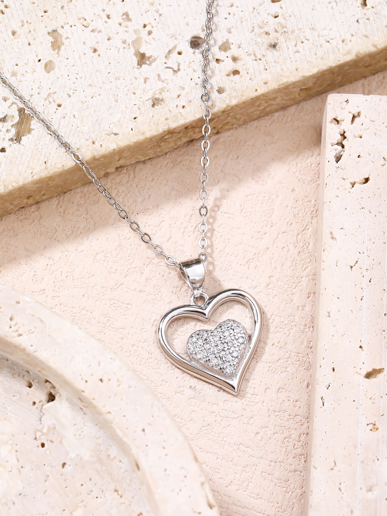 Double heart pendant with zirconia in hallmarked, rhodium-plated 925 sterling silver – display view – DRESCHER Jewellery®