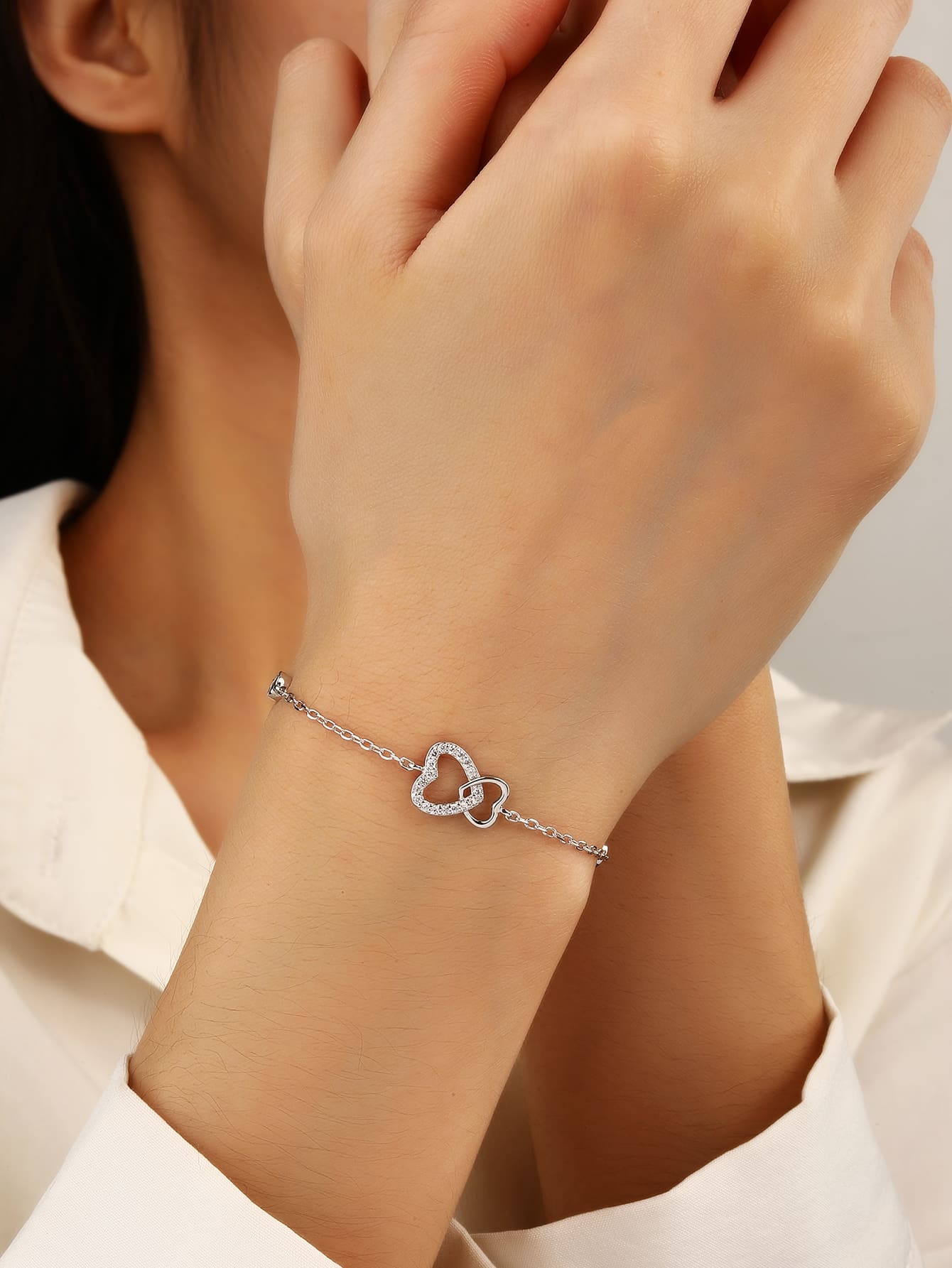 Double heart motif bracelet with cubic zirconia stones in hallmarked, rhodium-plated 925 sterling silver – dimensions view – DRESCHER Jewellery®