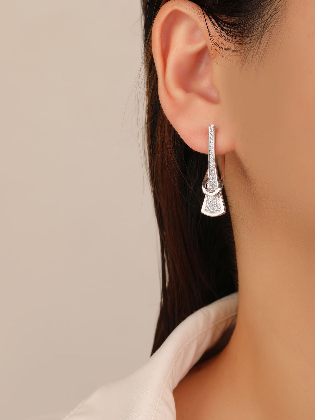 white cubic zirconia pierced-pattern French-clasp earrings in hallmarked, rhodium-plated 925 sterling silver – worn view – DRESCHER Jewellery®