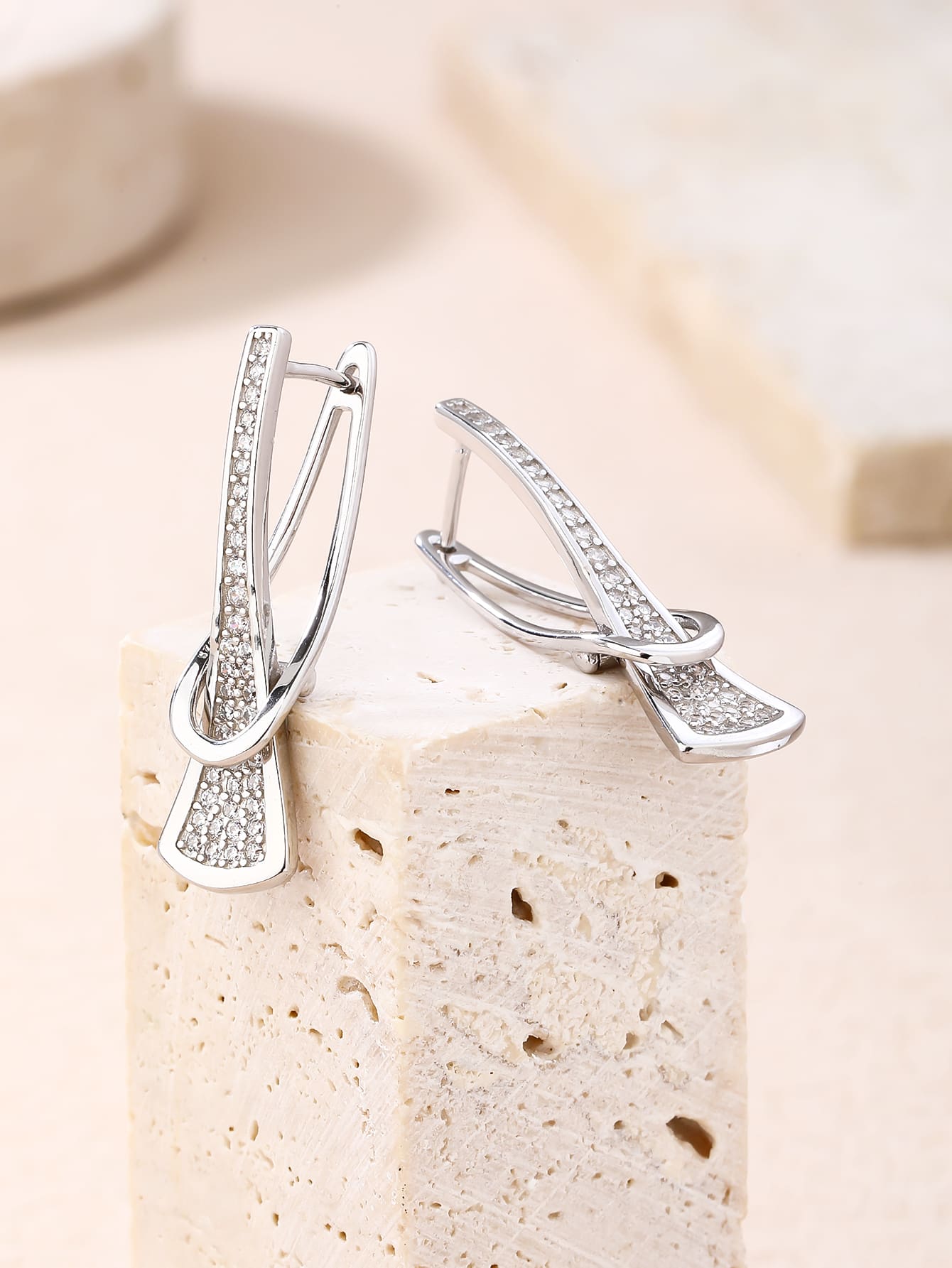 white cubic zirconia pierced-pattern French-clasp earrings in hallmarked, rhodium-plated 925 sterling silver – display view – DRESCHER Jewellery®
