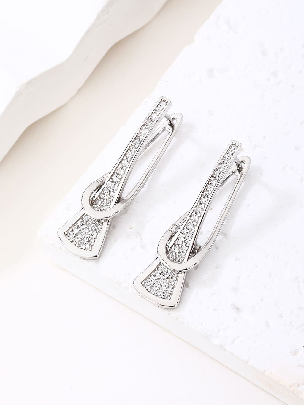white cubic zirconia pierced-pattern French-clasp earrings in hallmarked, rhodium-plated 925 sterling silver – lifestyle view – DRESCHER Jewellery®