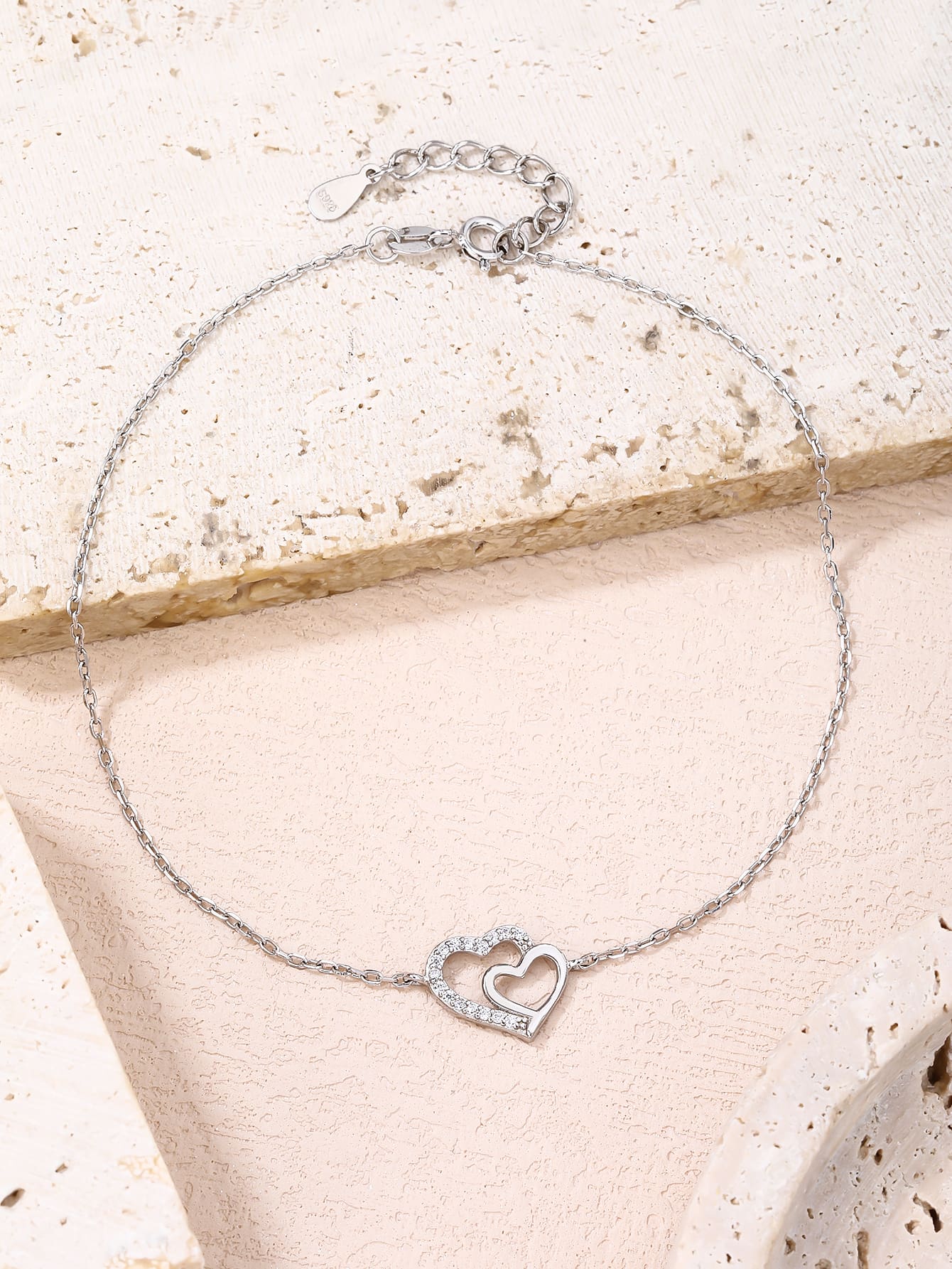anklet with double heart motif and cubic zirconia stones(23+4 cm) in hallmarked, rhodium-plated 925 sterling silver – alternate front view – DRESCHER Jewellery®
