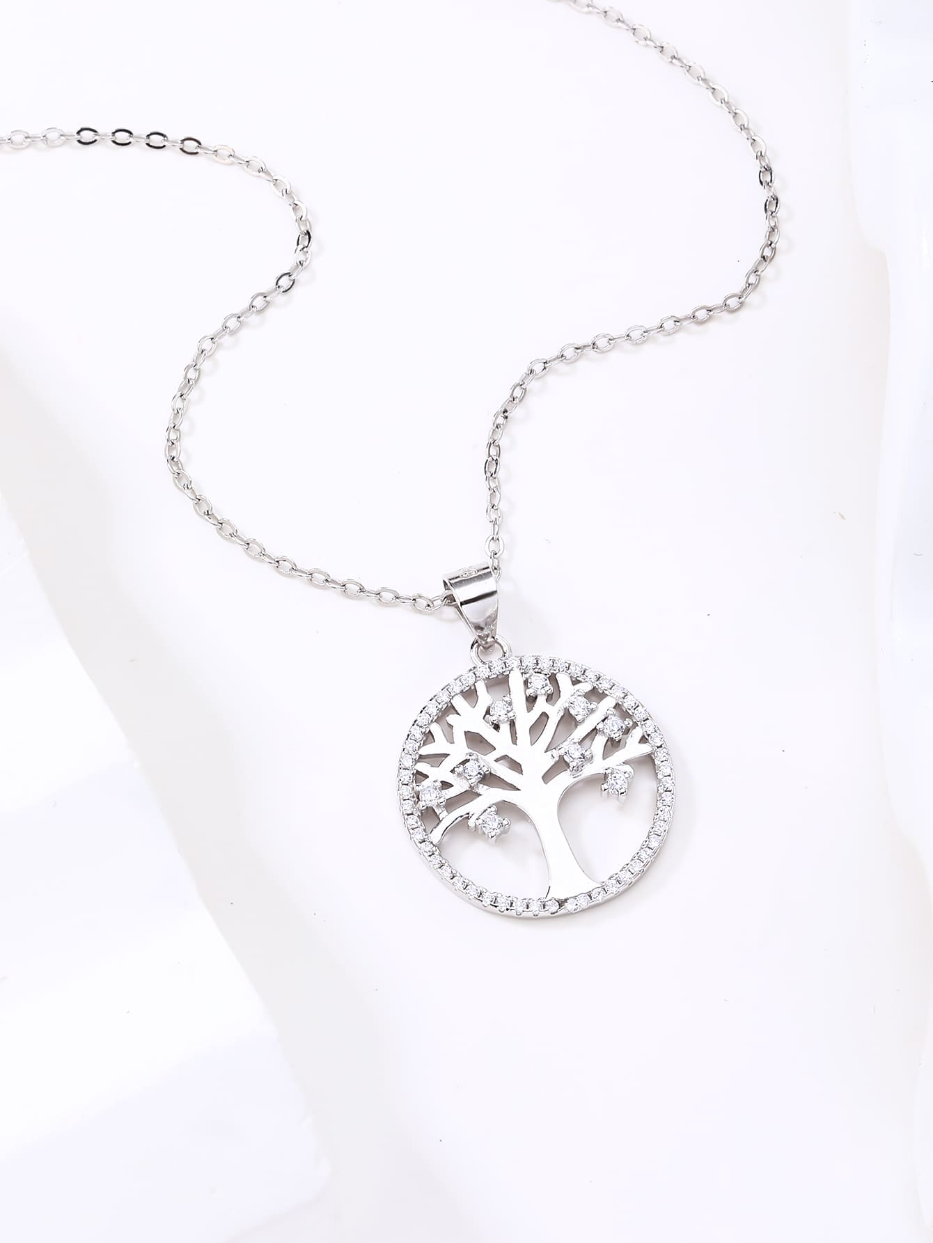 zirconia stone tree of life pendant - without chain in hallmarked, rhodium-plated 925 sterling silver – display view – DRESCHER Jewellery®