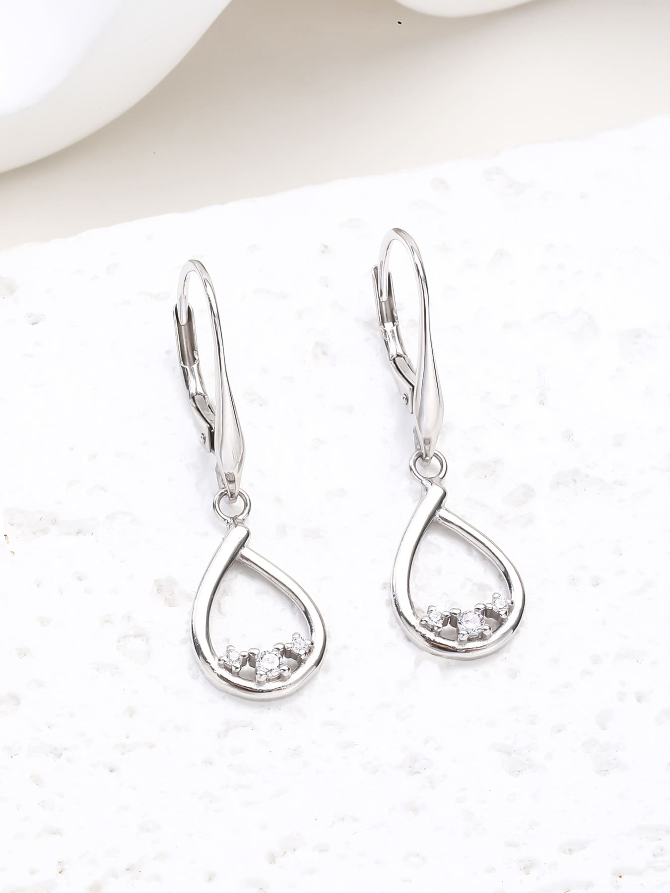 Teardrop white cubic zirconia leverback earrings in hallmarked, rhodium-plated 925 sterling silver – display view – DRESCHER Jewellery®