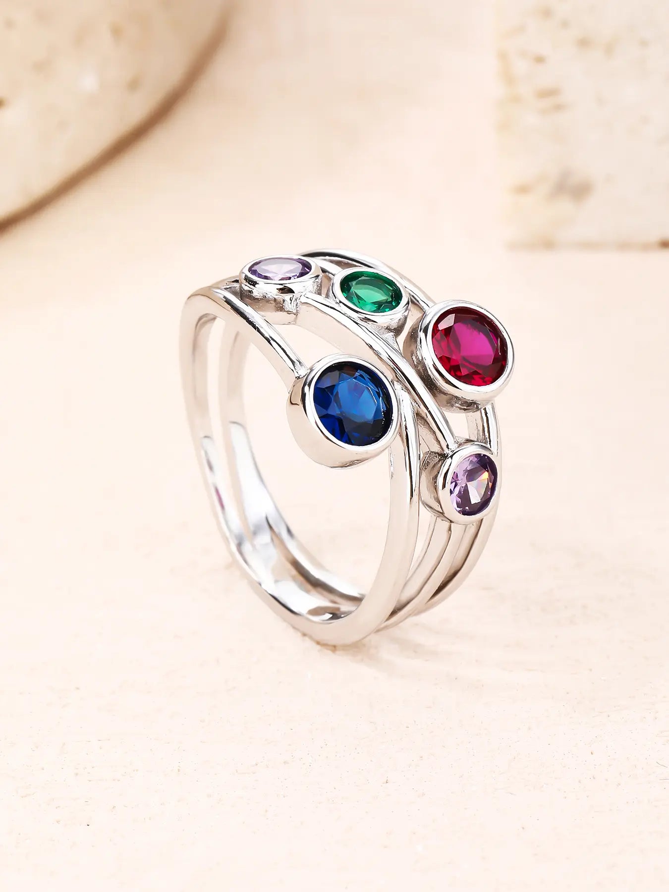 Silver design ring with coloured cubic zirconia stones