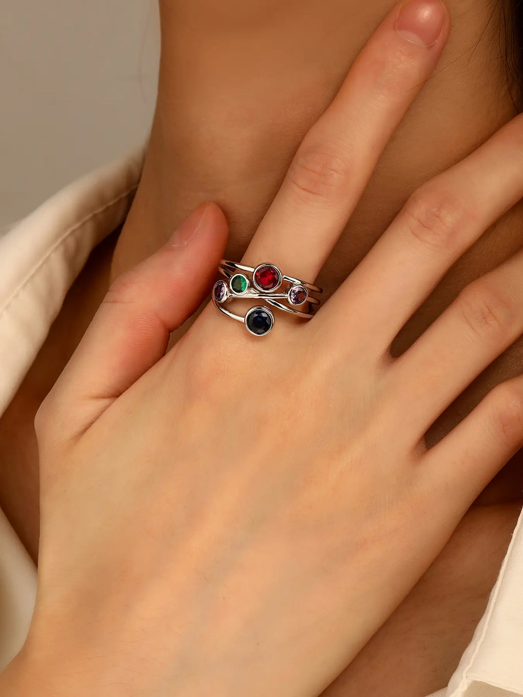 Silver design ring with coloured cubic zirconia stones