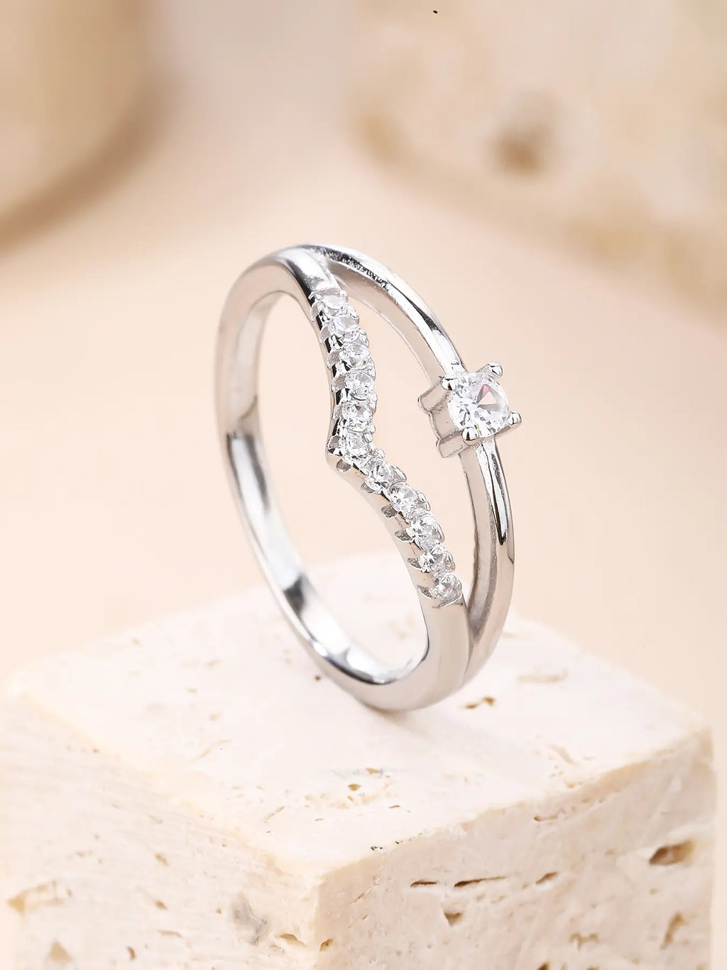 Silver engagement ring with white cubic zirconia stones