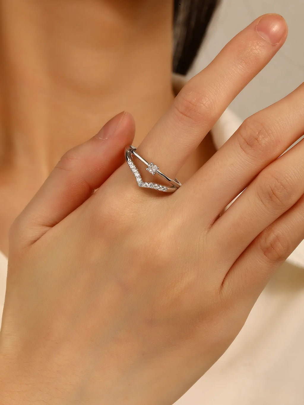 Silver engagement ring with white cubic zirconia stones