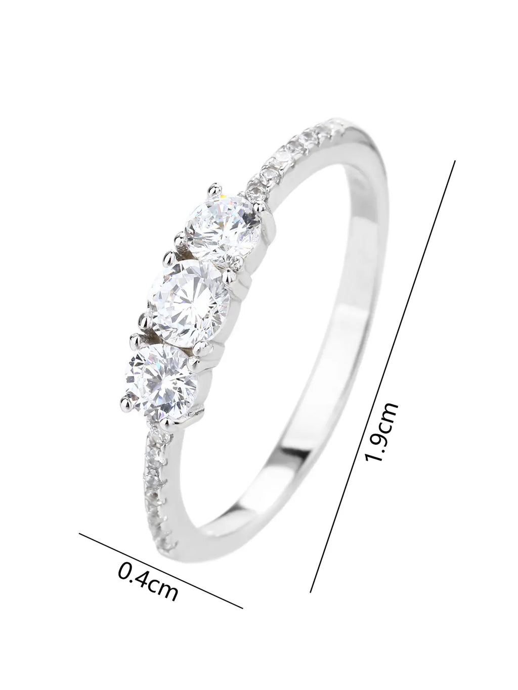 Silver engagement ring with three central and small cubic zirconia stones