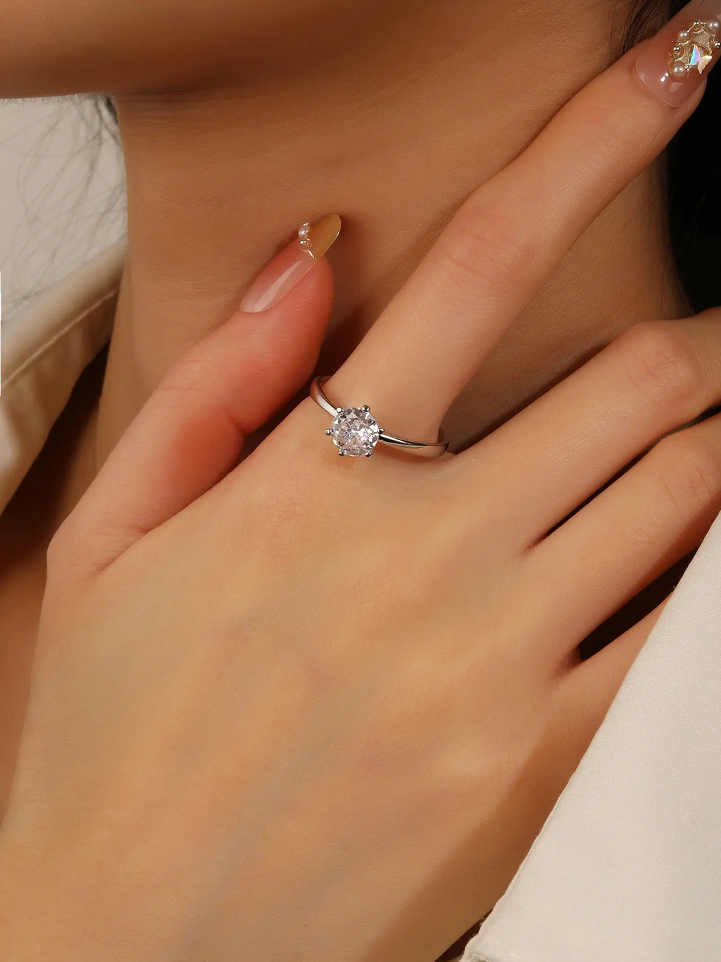 Silver engagement solitaire ring with white cubic zirconia stone