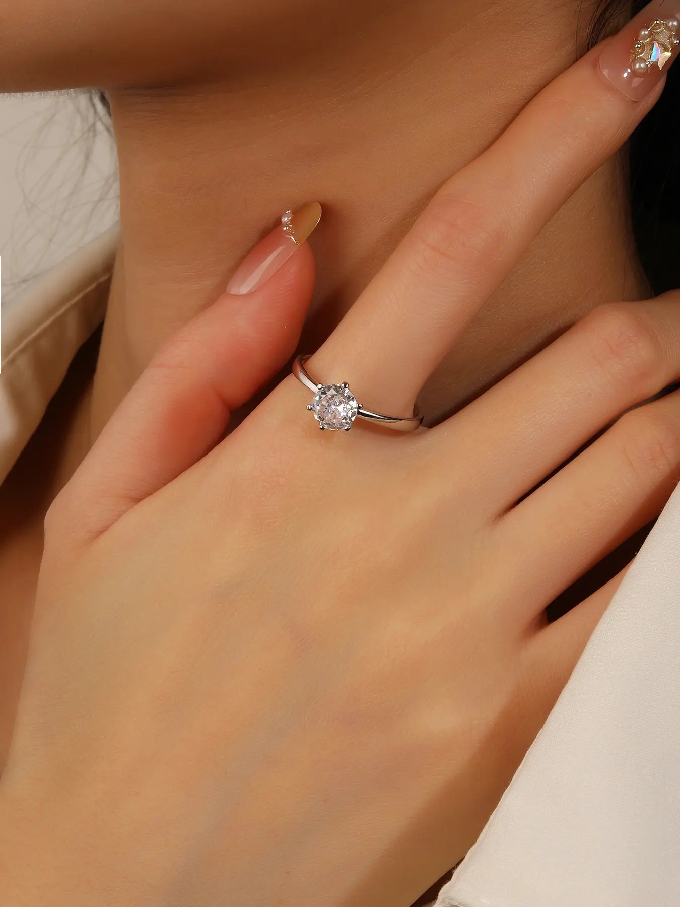 Silver engagement solitaire ring with white cubic zirconia stone