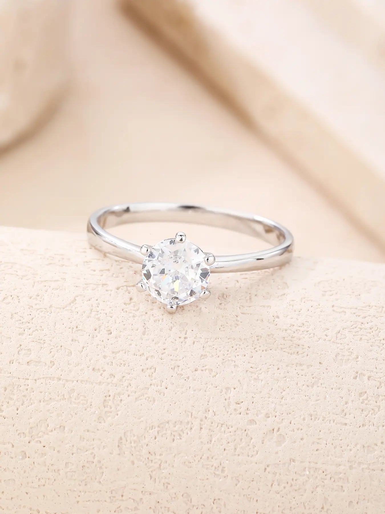Silver engagement solitaire ring with white cubic zirconia stone