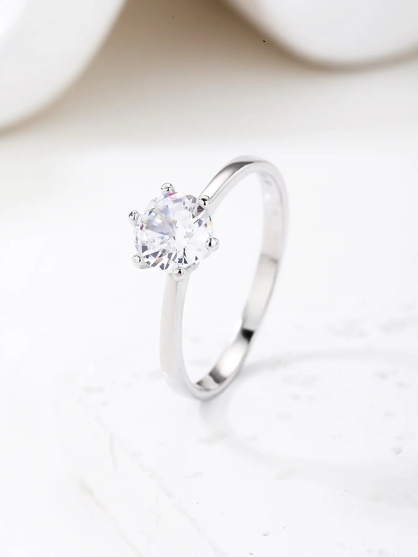 Silver engagement solitaire ring with white cubic zirconia stone