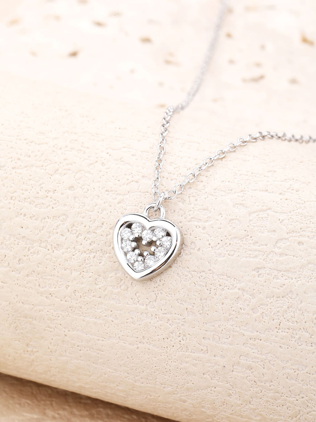 white stone heart necklace in hallmarked, rhodium-plated 925 sterling silver – display view – DRESCHER Jewellery®