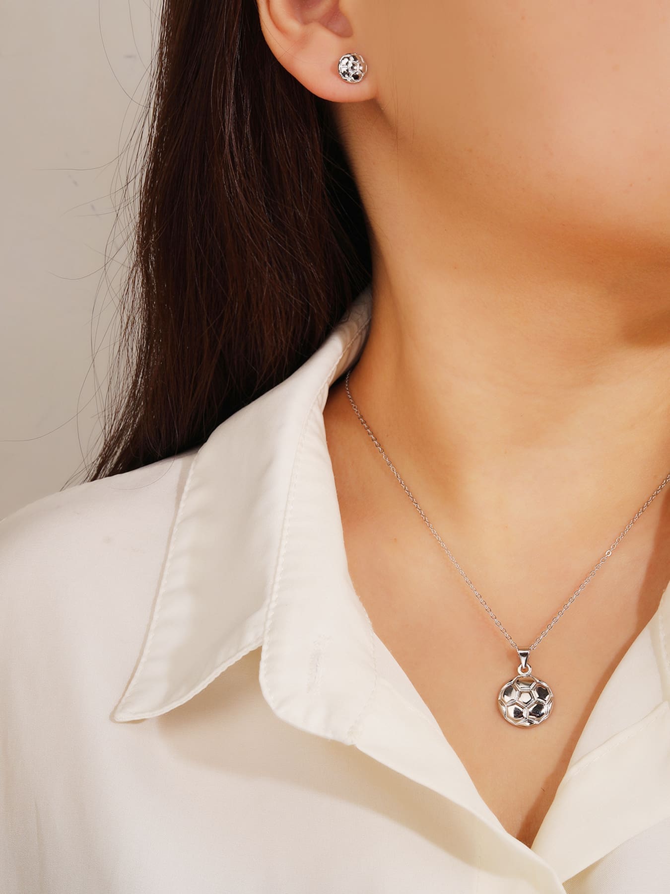 football wedge set in hallmarked, rhodium-plated 925 sterling silver – pendant front view – DRESCHER Jewellery®