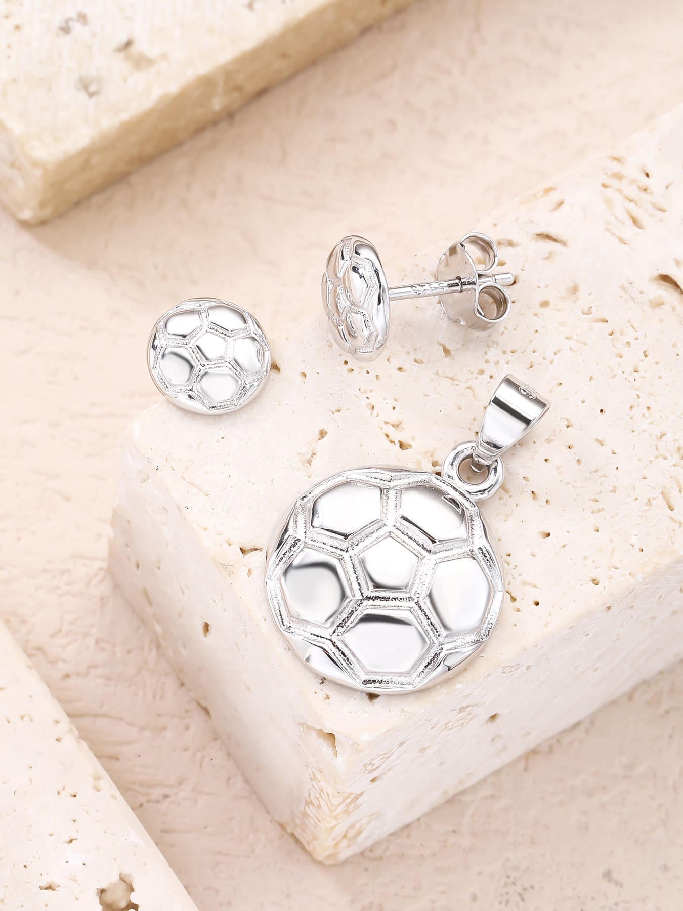 football wedge set in hallmarked, rhodium-plated 925 sterling silver – worn view – DRESCHER Jewellery®