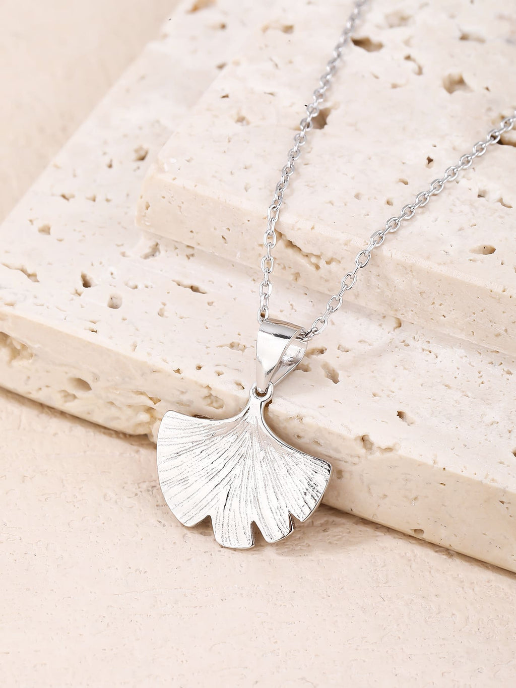 ginkgo biloba leaf necklace in hallmarked, rhodium-plated 925 sterling silver – lifestyle view – DRESCHER Jewellery®