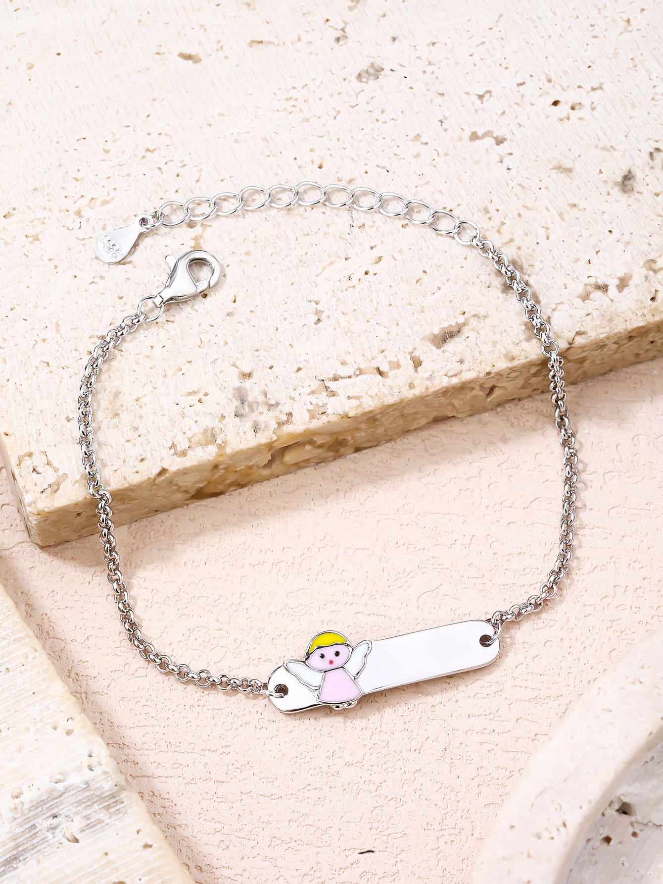bracelet for children with angel figure, engravable (14+4 cm) in hallmarked, rhodium-plated 925 sterling silver – worn view – DRESCHER Jewellery®