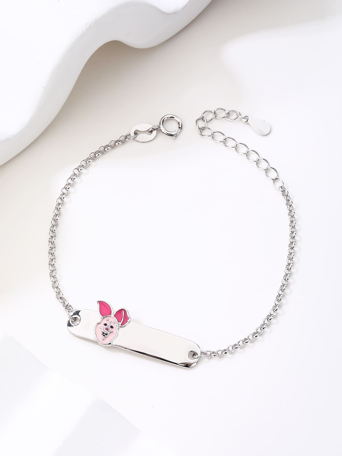 Pink enamel pig hallmarked, rhodium-plated 925 sterling silver children’s ID bracelet – display view – DRESCHER Jewellery®