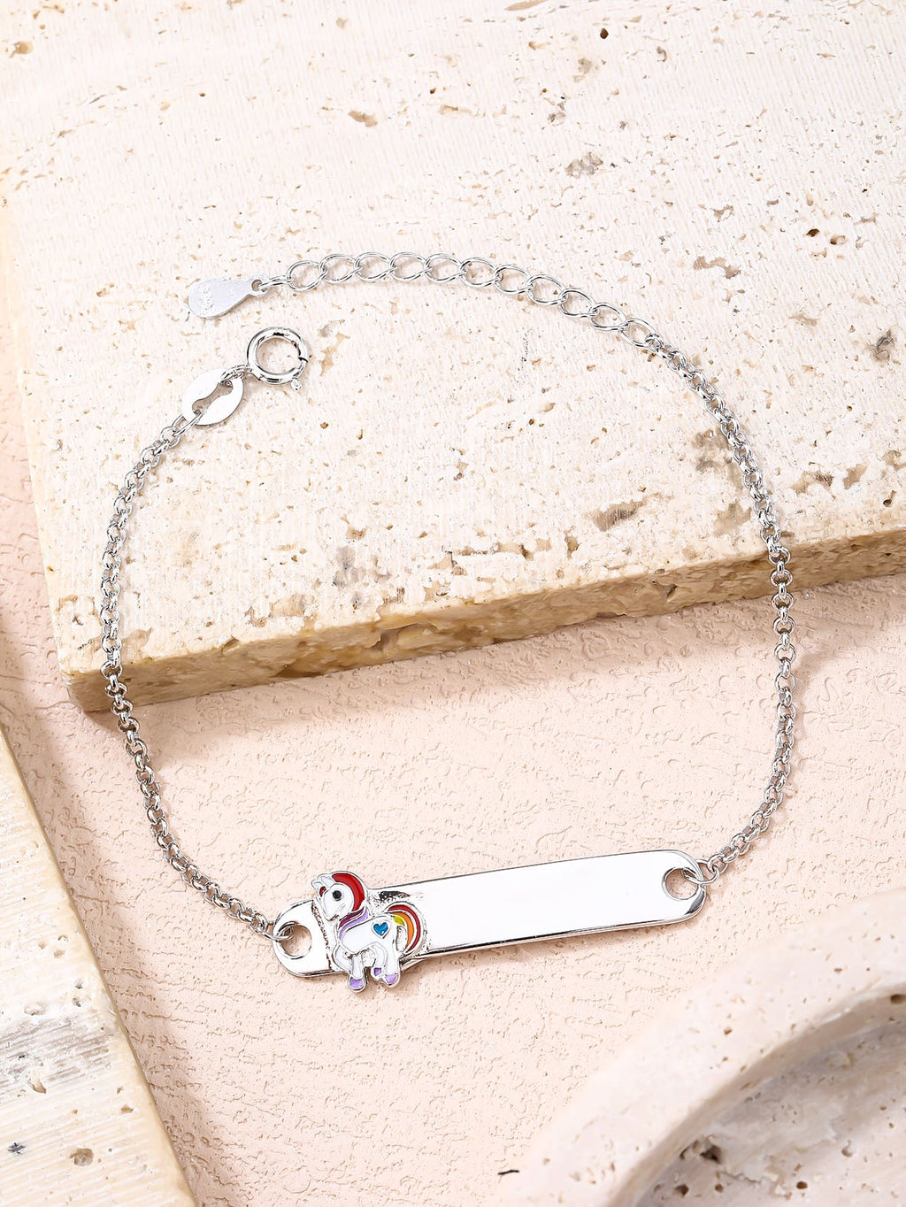 Children's silver bracelet with unicorn figure, engravable (15+4 cm) in hallmarked, rhodium-plated 925 sterling silver – alternate worn view – DRESCHER Jewellery®