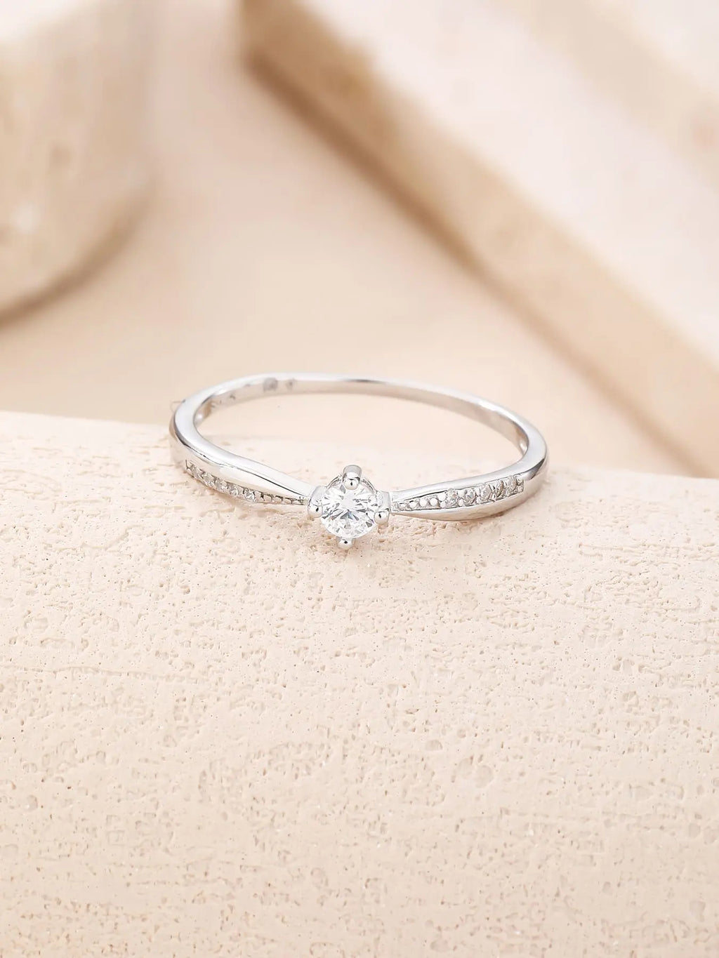 Silver ring with white cubic zirconia stones