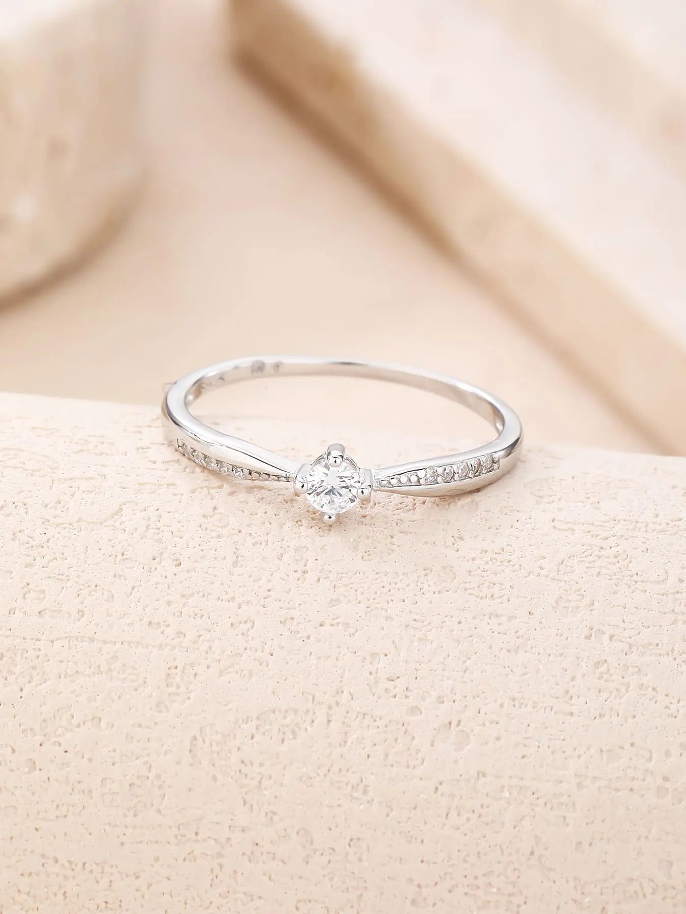 Silver ring with white cubic zirconia stones