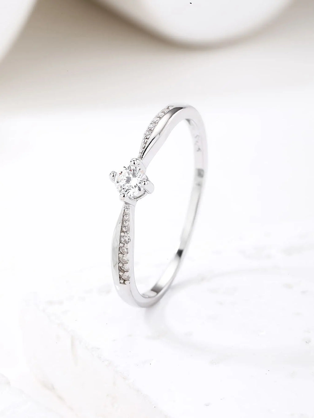 Silver ring with white cubic zirconia stones