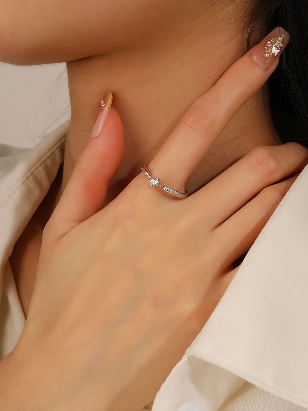 Silver ring with white cubic zirconia stones