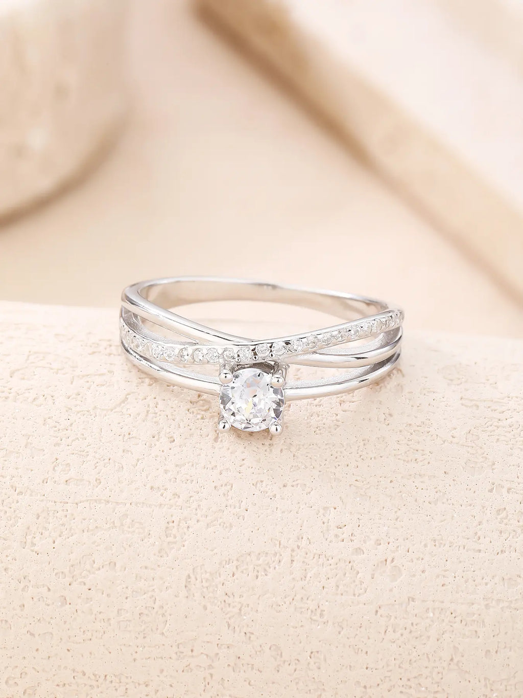 Silver engagement ring with white cubic zirconia stones