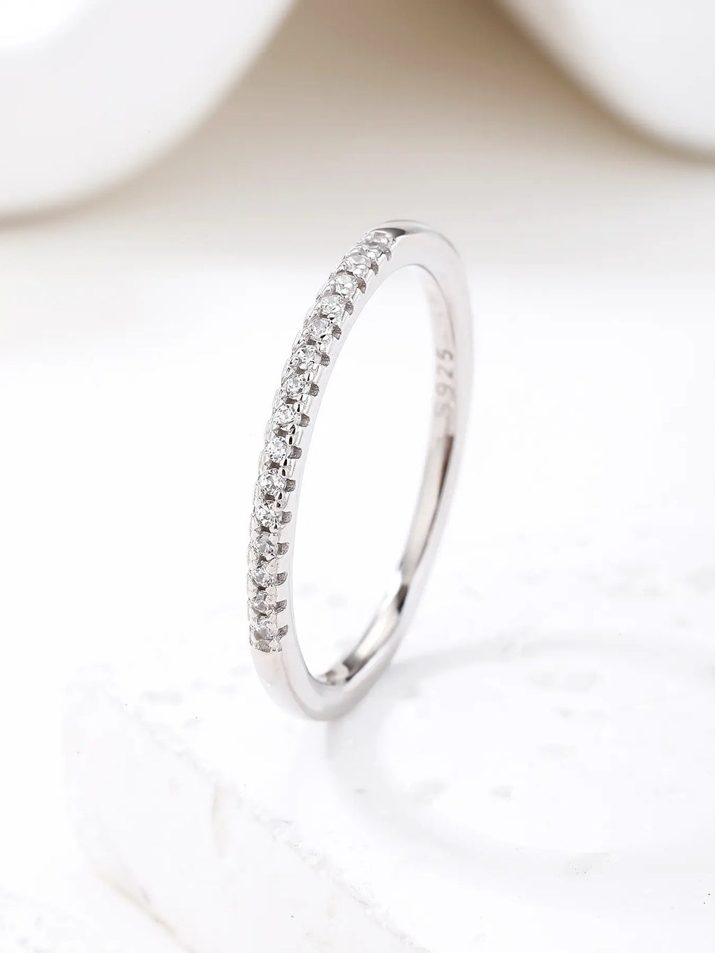 Silver ring with white cubic zirconia stones