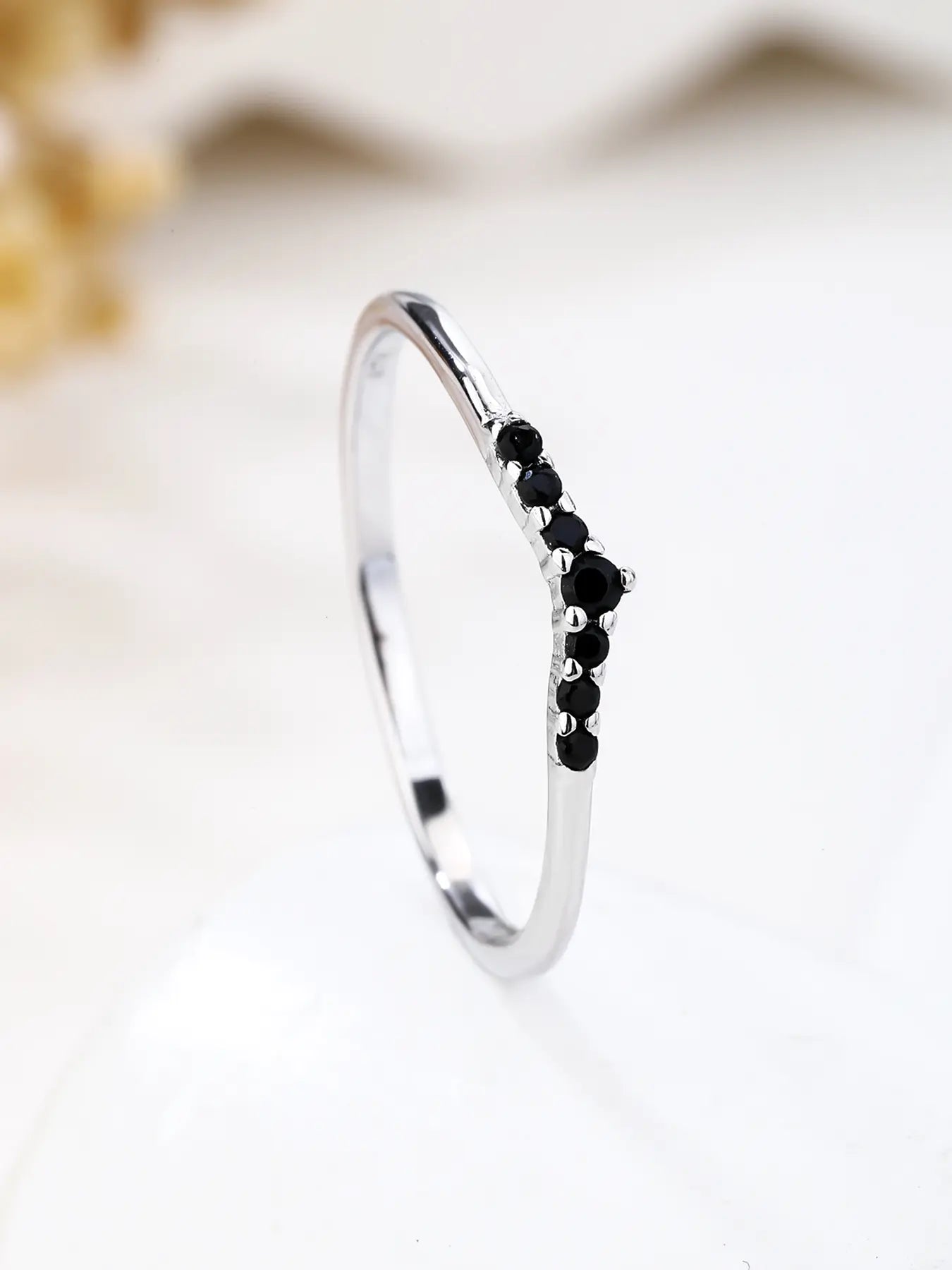 Silver ring with black cubic zirconia stones, V-shaped decoration