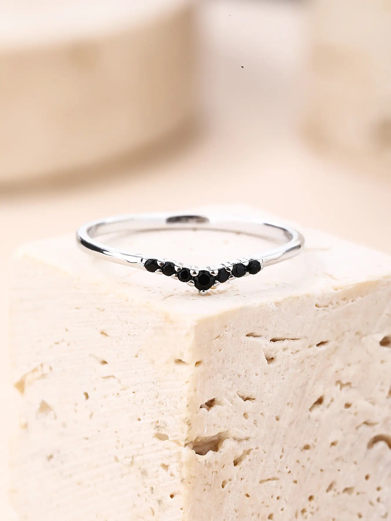 Silver ring with black cubic zirconia stones, V-shaped decoration