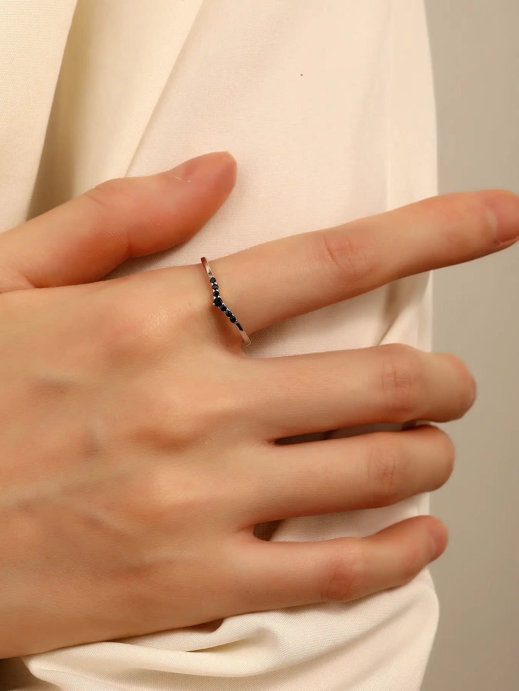 Silver ring with black cubic zirconia stones, V-shaped decoration