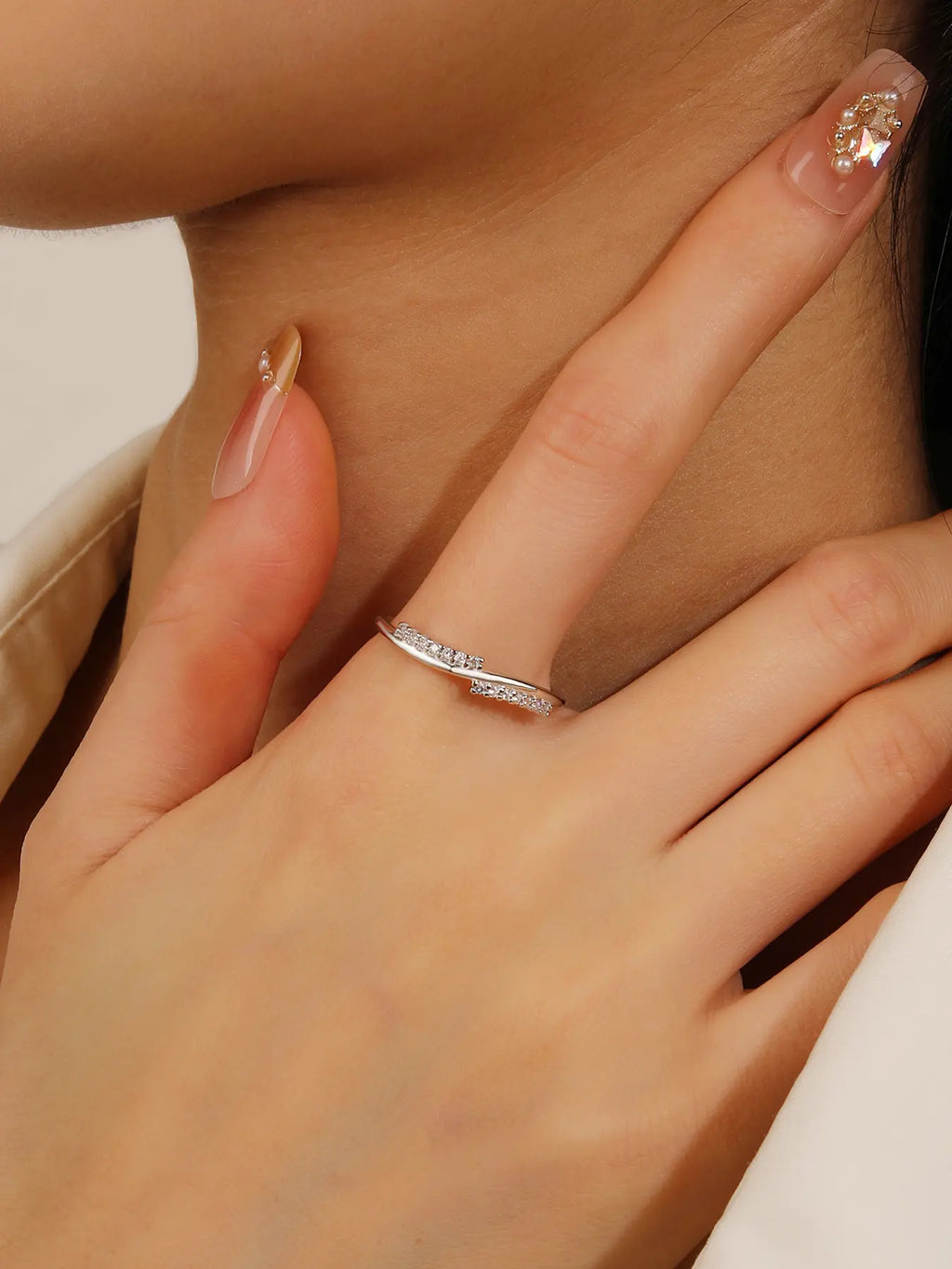 Silver ring with curved lines and zirconia decoration