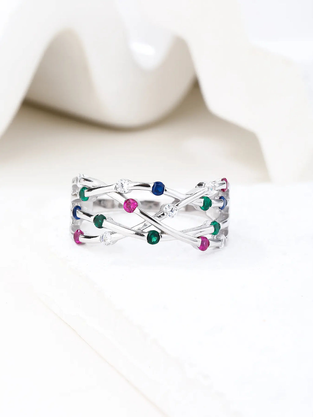 Silver ring with multicoloured cubic zirconia stones