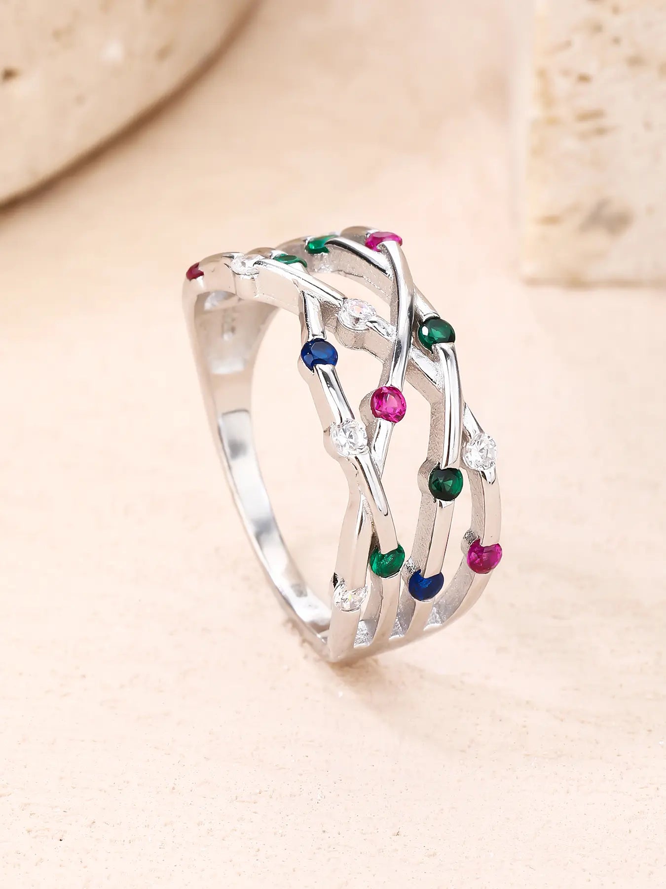 Silver ring with multicoloured cubic zirconia stones