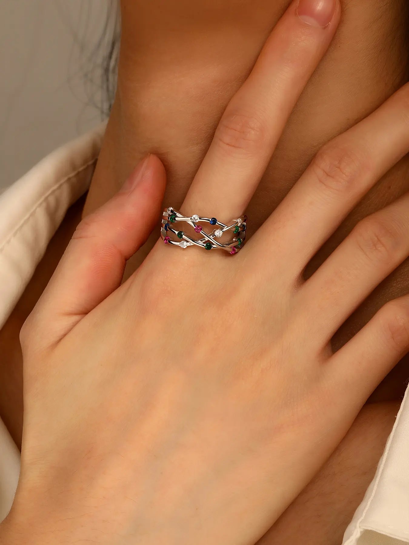 Silver ring with multicoloured cubic zirconia stones