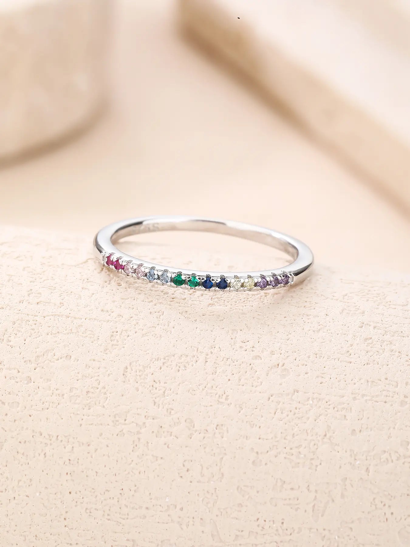 Silver ring with rainbow cubic zirconia stones