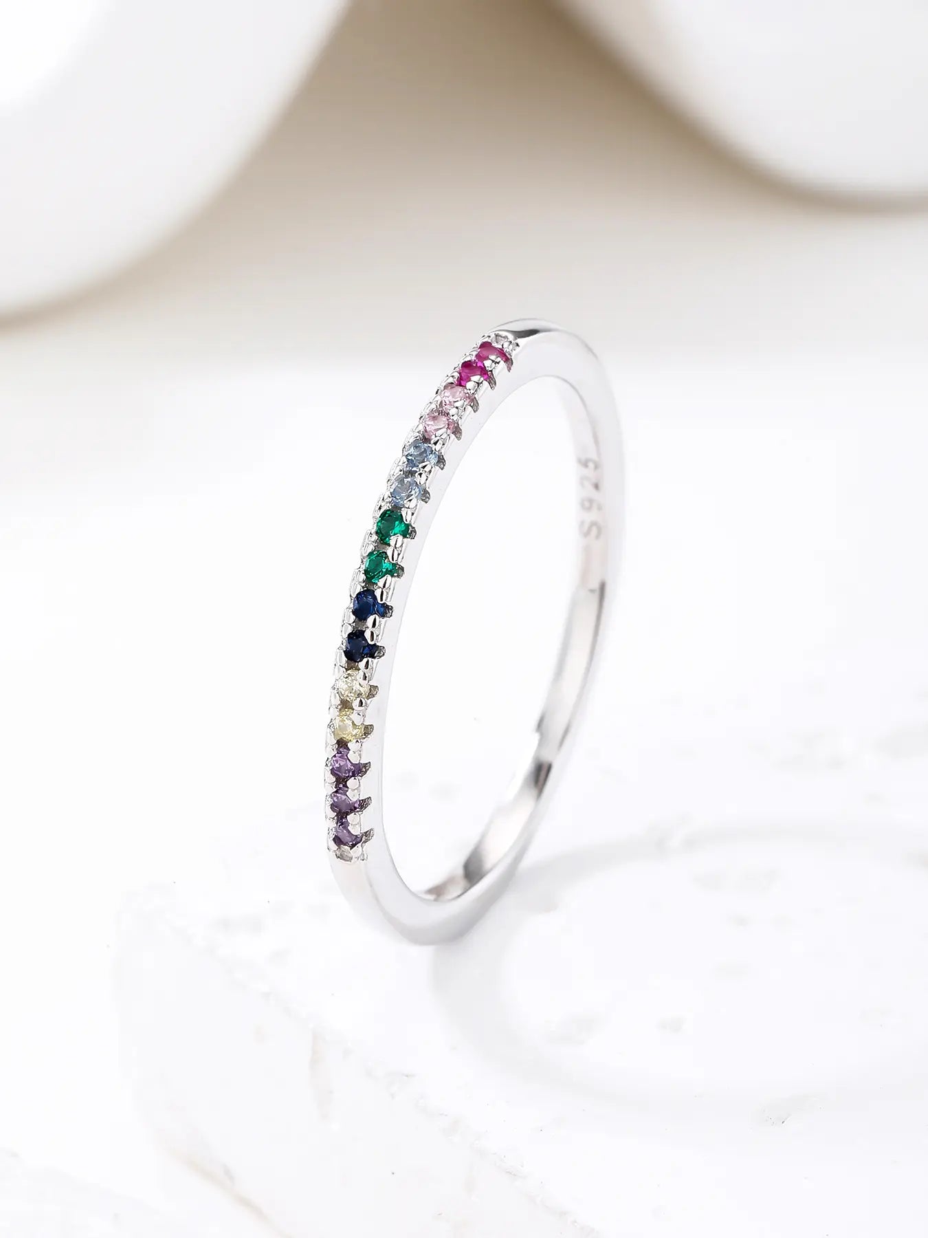 Silver ring with rainbow cubic zirconia stones