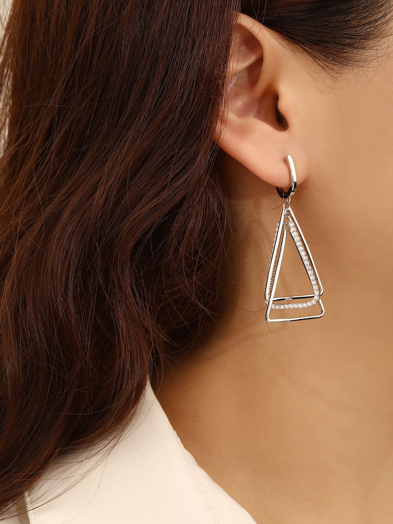 Open triangle white stone leverback earrings in hallmarked, rhodium-plated 925 sterling silver – worn view – DRESCHER Jewellery®