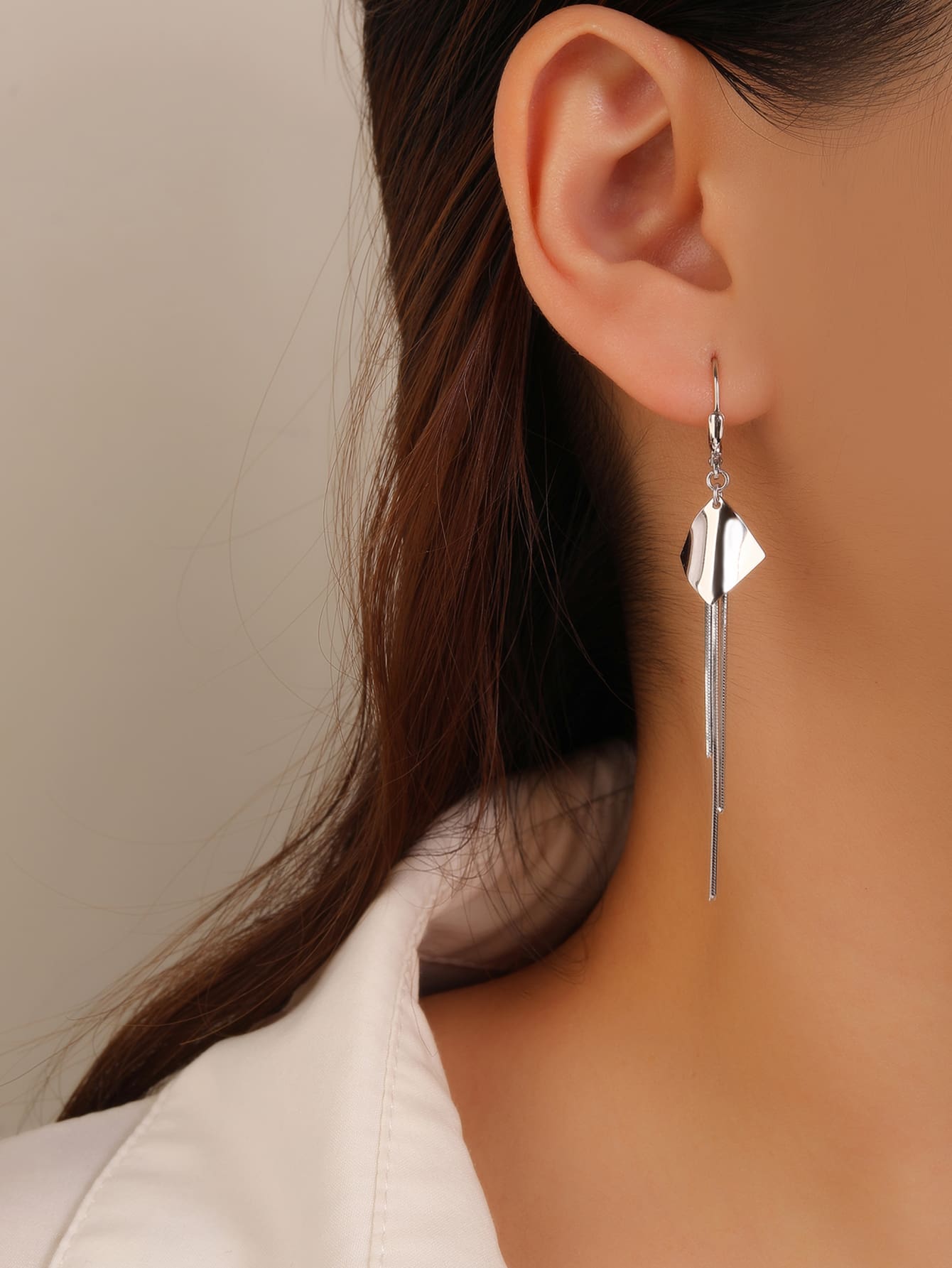 Geometric diamond-motif chain drop leverback earrings in hallmarked, rhodium-plated 925 sterling silver – worn view – DRESCHER Jewellery®