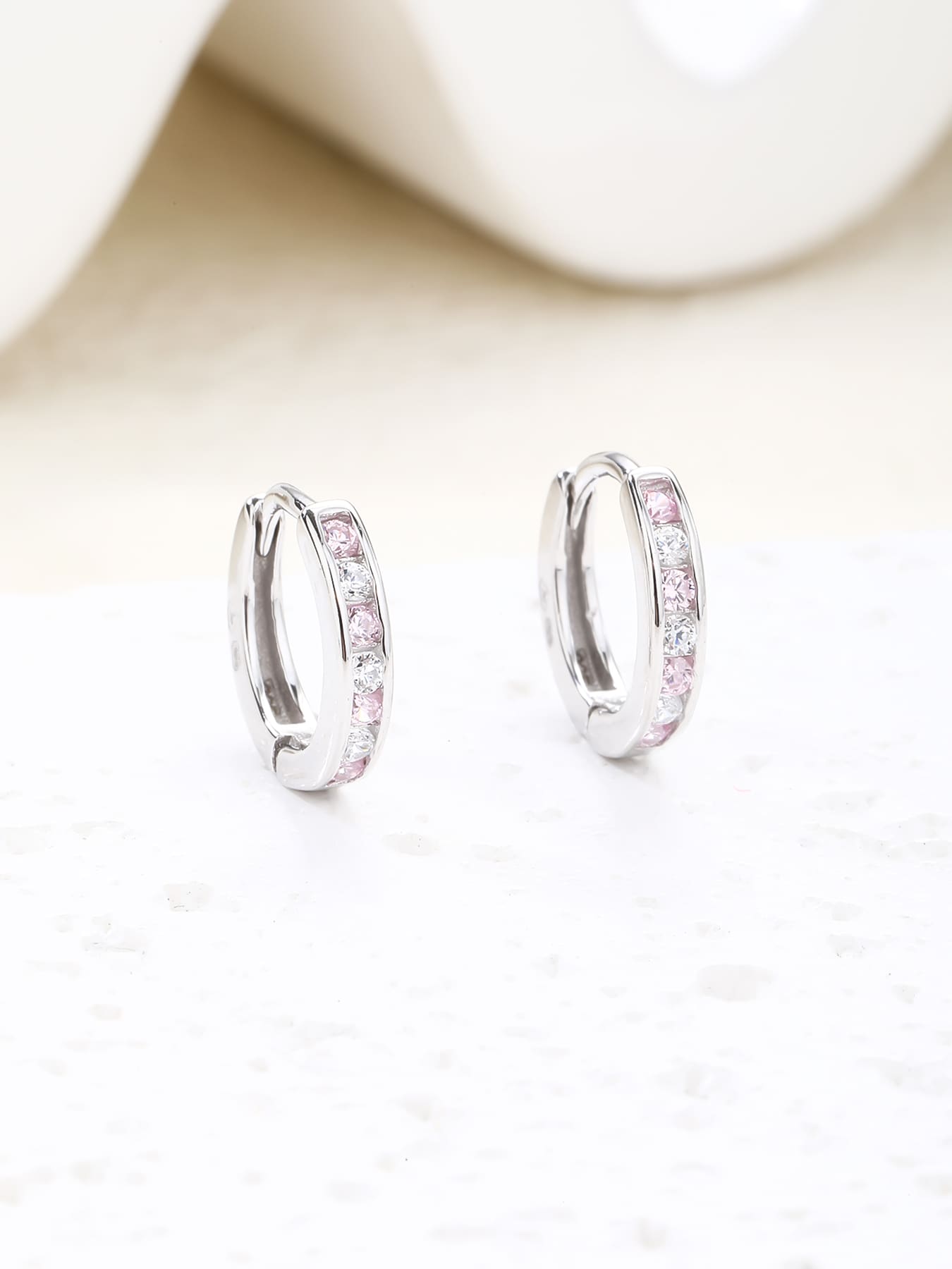 Pink and white cubic zirconia hoop earrings in hallmarked, rhodium-plated 925 sterling silver – display view – DRESCHER Jewellery®