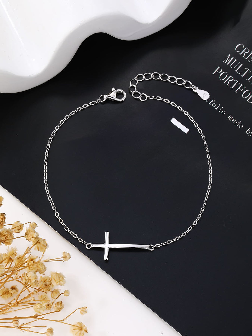 bracelet with cross motif in hallmarked, rhodium-plated 925 sterling silver – worn view – DRESCHER Jewellery®