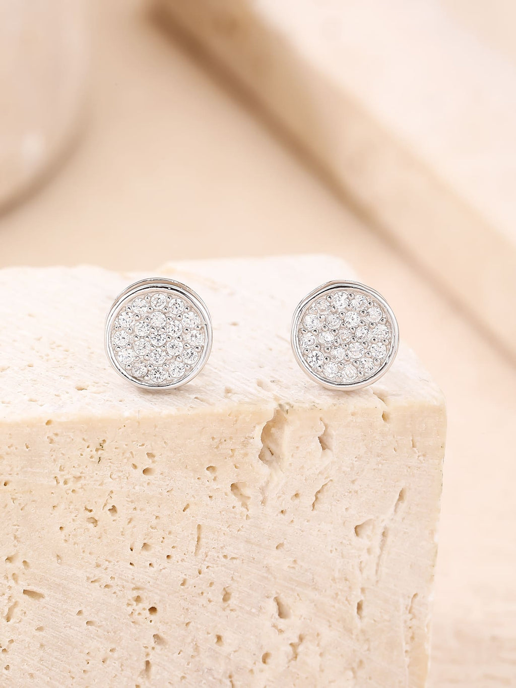 Round pavé white cubic zirconia stud earrings in hallmarked, rhodium-plated 925 sterling silver – display view – DRESCHER Jewellery®